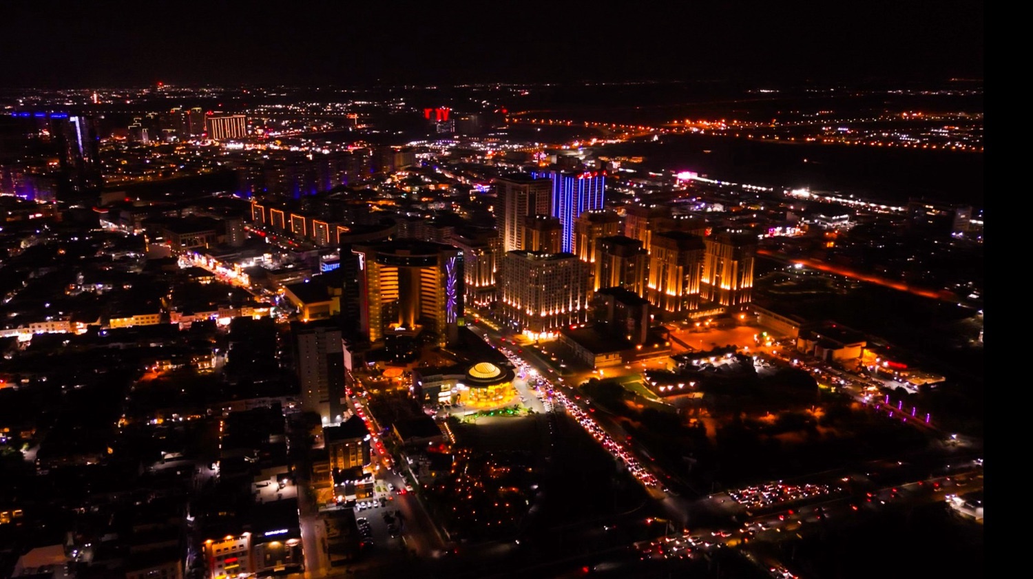 A Kurdish city at night, representing opportunity and growth