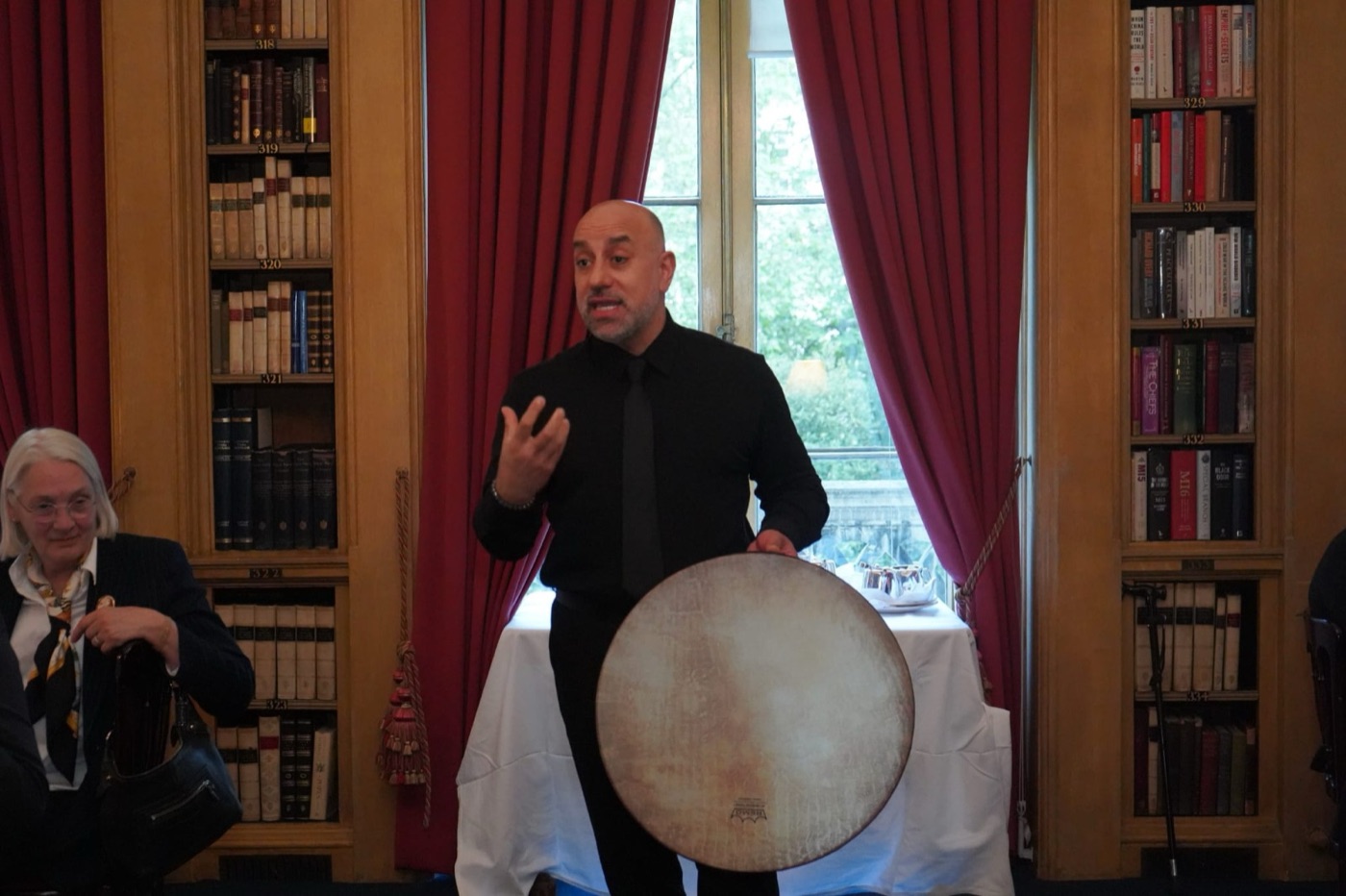 Musician Hajar Zahawy plays the daf, a traditional Kurdish frame drum