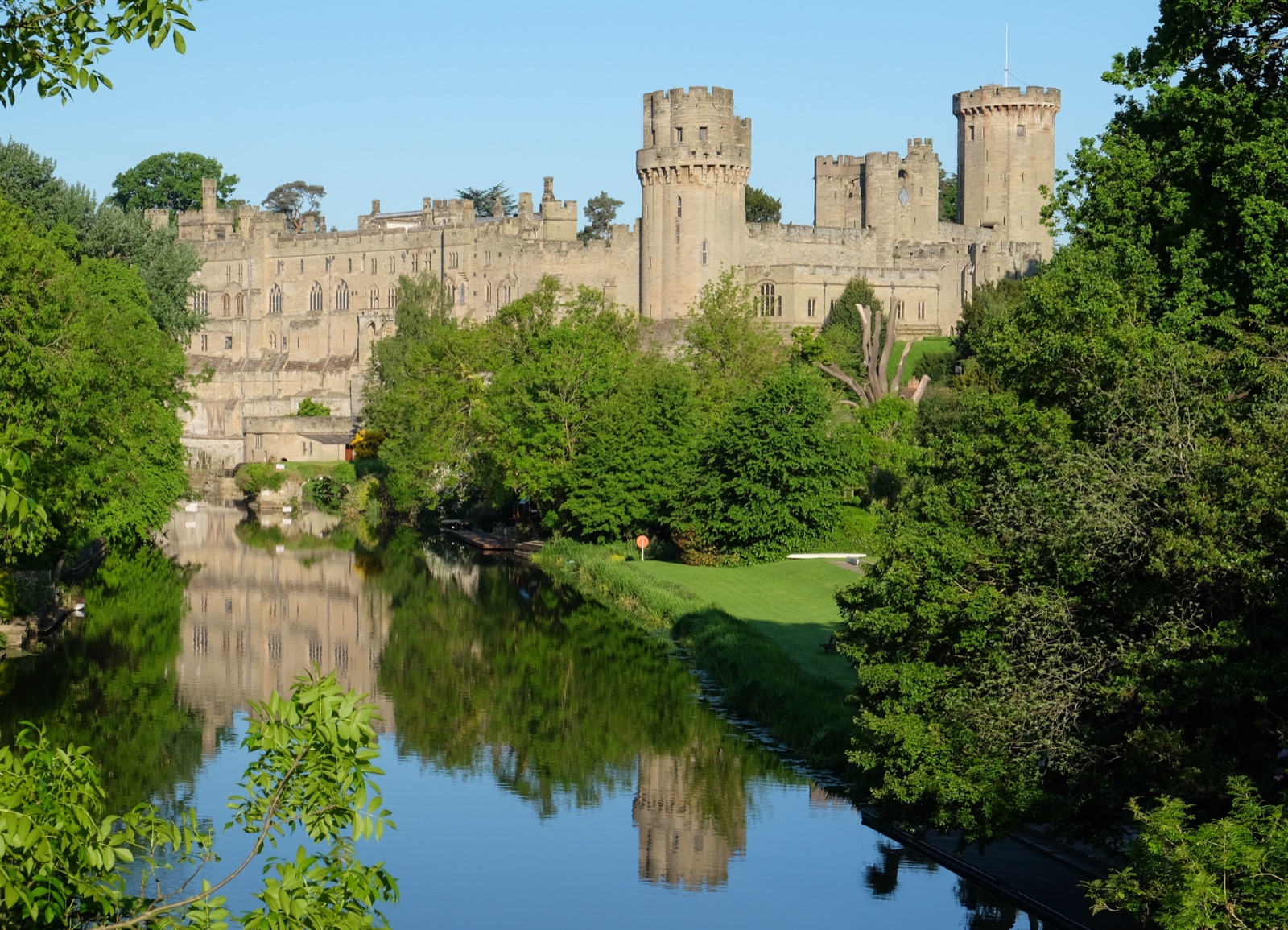 Warwick Castle reflected in the river, United Kingdom